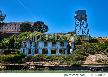Close up view of Alcatraz Island with abandoned building and water tower 109368094