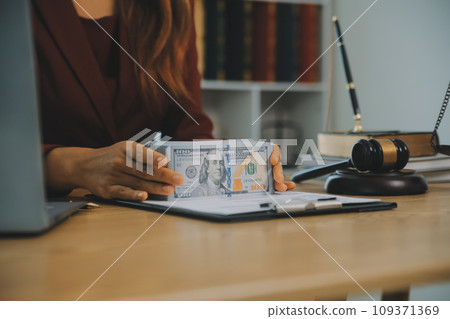 Lawyer, legal advisor, businessman brainstorming information on agreement details Business contracts in legal processing books for accuracy in contract documents. joint financial investment. Lawyer, legal advisor, businessman brainstorming information on agreement details Business contracts in legal processing books for accuracy in contract documents. joint financial investment. 109371369