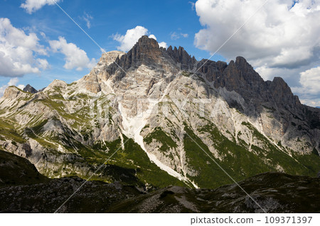 Rocky mountain peaks of Italian Dolomites on sunny summer day Rocky mountain peaks of Italian Dolomites on sunny summer day 109371397