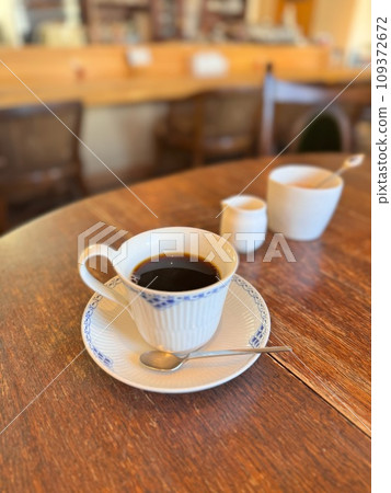 coffee on a table in a cafe 109372672