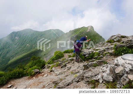 Mount Tanigawa is One of Japanese famous 100 mountains. Mount Tanigawa, Tanigawadake is a craggy, rugged mountain found on the border of Gunma and Niigata prefectures in northern Minakami. Mount Tanigawa is One of Japanese famous 100 mountains. Mount Tanigawa, Tanigawadake is a craggy, rugged mountain found on the border of Gunma and Niigata prefectures in northern Minakami. 109372713