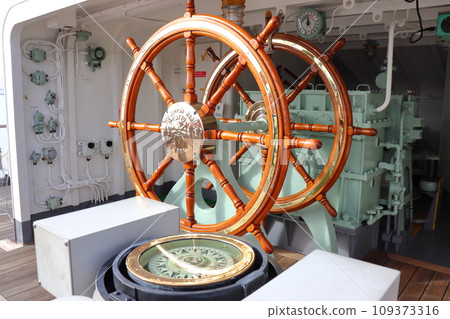 Ship control stick (helm) and compass 109373316