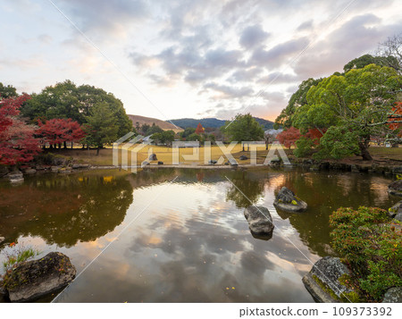Nara Park Kasuganoenchi and Sansha Trust Pond in autumn with beautiful sunrises Nara Park Kasuganoenchi and Sansha Trust Pond in autumn with beautiful sunrises 109373392
