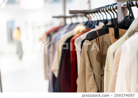 Clothes on a hanger rack 109374097