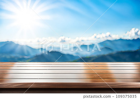 Empty wood tabletop or counter with display product. Blur image of blue sky and hill background. Display product background 109375035