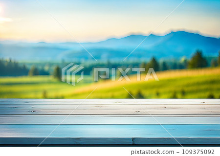 Empty wood tabletop or counter with display product. Blur image of blue sky and hill background. Display product background Empty wood tabletop or counter with display product. Blur image of blue sky and hill background. Display product background 109375092