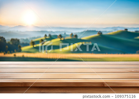 Empty wood tabletop or counter with display product. Blur image of blue sky and hill background. Display product background Empty wood tabletop or counter with display product. Blur image of blue sky and hill background. Display product background 109375116