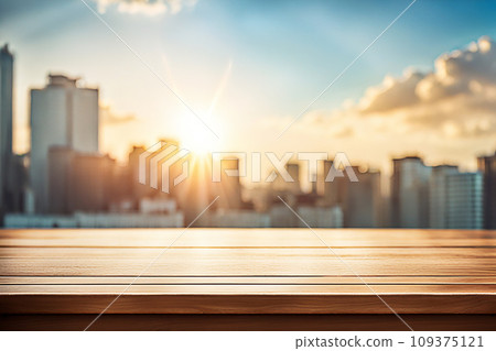 Empty wood tabletop or counter with display product. Blur image of blue sky and hill background. Display product background 109375121
