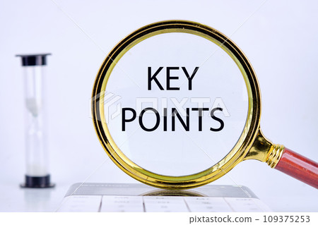KEY POINTS text, word, inscription found through a magnifying glass next to an hourglass on a light background 109375253