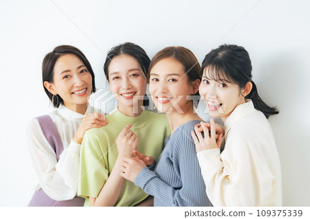 Group of smiling casual middle-aged women Group of smiling casual middle-aged women 109375339