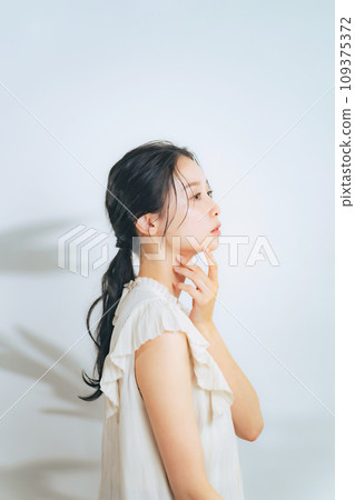 Beauty image of a woman with natural makeup Beauty image of a woman with natural makeup 109375372