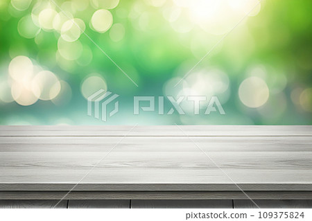 Empty wood tabletop or counter with display product. Blur image of green leaves bokeh background. Display product background concept Empty wood tabletop or counter with display product. Blur image of green leaves bokeh background. Display product background concept 109375824