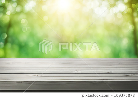 Empty wood tabletop or counter with display product. Blur image of green leaves bokeh background. Display product background concept Empty wood tabletop or counter with display product. Blur image of green leaves bokeh background. Display product background concept 109375878