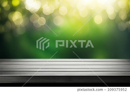 Empty wood tabletop or counter with display product. Blur image of green leaves bokeh background. Display product background concept Empty wood tabletop or counter with display product. Blur image of green leaves bokeh background. Display product background concept 109375952