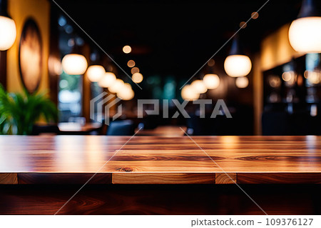 Empty wood tabletop or counter with display product. Blur image of restaurant,coffee shop background. Display product background concept 109376127