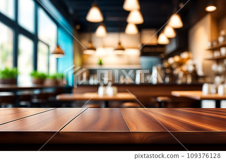 Empty wood tabletop or counter with display product. Blur image of restaurant,coffee shop background. Display product background concept Empty wood tabletop or counter with display product. Blur image of restaurant,coffee shop background. Display product background concept 109376128