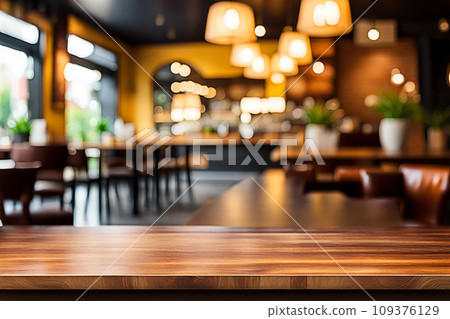 Empty wood tabletop or counter with display product. Blur image of restaurant,coffee shop background. Display product background concept Empty wood tabletop or counter with display product. Blur image of restaurant,coffee shop background. Display product background concept 109376129
