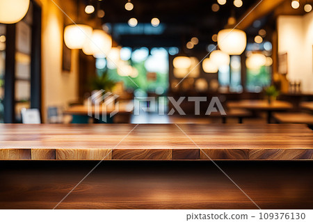 Empty wood tabletop or counter with display product. Blur image of restaurant,coffee shop background. Display product background concept Empty wood tabletop or counter with display product. Blur image of restaurant,coffee shop background. Display product background concept 109376130