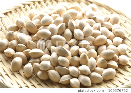 A photo of ginkgo seeds in a basket against a white background A photo of ginkgo seeds in a basket against a white background 109376732