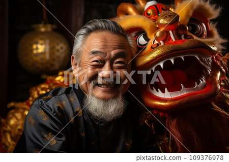 Portrait of a senior Chinese man in traditional costume with Chinese New Year decoration 109376978