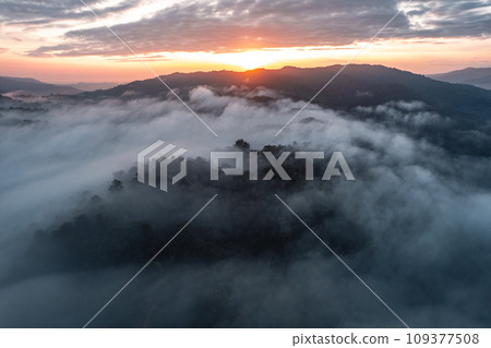 Morning  Sky and Mountains,view of sunrise or sunset over mountain and misty. 109377508