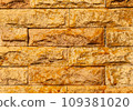 Background Sandstone patterned walls in my house. 109381020