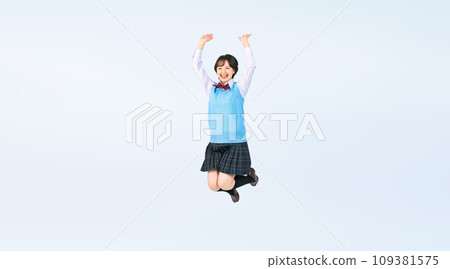 Female student in uniform jumping, cropped full body photo 109381575