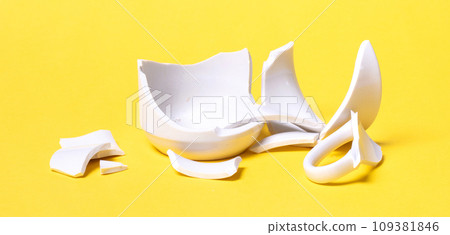 Broken cup isolated on a solid background Broken cup isolated on a solid background 109381846
