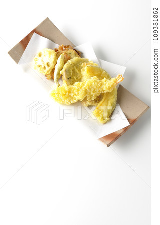 An overhead shot of an assortment of shrimp, chikuwa, green beans, pumpkin, sweet potato, and lotus root tempura against a white background An overhead shot of an assortment of shrimp, chikuwa, green beans, pumpkin, sweet potato, and lotus root tempura against a white background 109381862