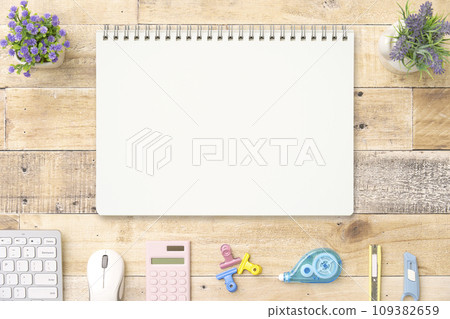 Notebook on desk overhead shot Notebook on desk overhead shot 109382659