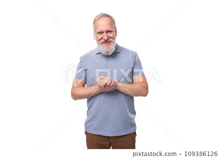 confused old man with white mustache and beard dressed in basic t-shirt and pants 109386126
