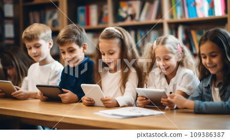 Kids Using Tablets at School Kids Using Tablets at School 109386387