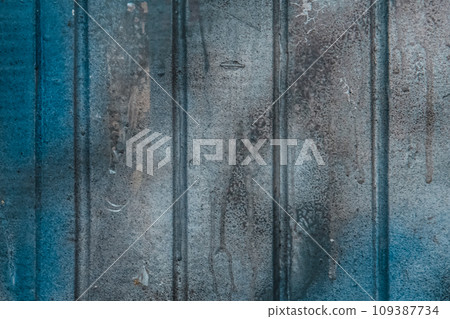 Blue paint on old dirty fence surface weathered texture background Blue paint on old dirty fence surface weathered texture background 109387734