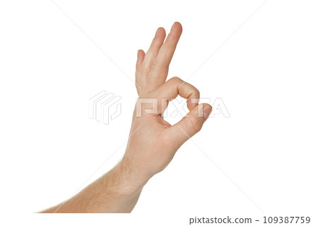 male hand showing Ok gesture isolated on white background 109387759