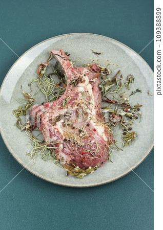 Raw barbecue Tomahawk steak 109388899