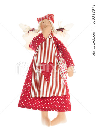 Handmade doll in red dress with heart maded from red color natural cotton linen material. Handmade doll in red dress with heart maded from red color natural cotton linen material. 109388978