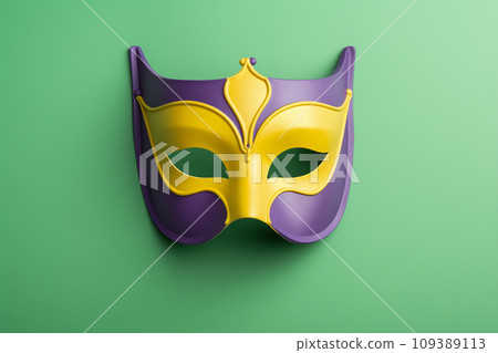 Mardi gras carnival concept - green, yellow and purple mask with decorations Mardi gras carnival concept - green, yellow and purple mask with decorations 109389113