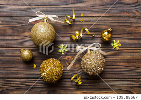 Christmas ball on colored background. decoration bauble with ribbon bow with copy space 109389667
