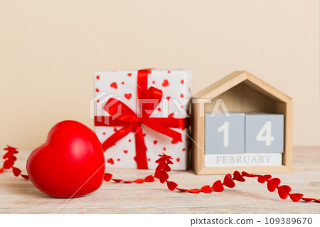 Valentine Day theme with wooden block calendar. Greeting card template for Valentines Day copy space for text 109389670