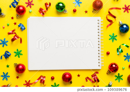Christmas blank greeting card mock-up scene. Creative layout made of Christmas tree branches and paper card note. Flat lay. Nature New Year concept Christmas blank greeting card mock-up scene. Creative layout made of Christmas tree branches and paper card note. Flat lay. Nature New Year concept 109389676