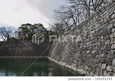Osaka Castle Park stone wall and moat 109391245