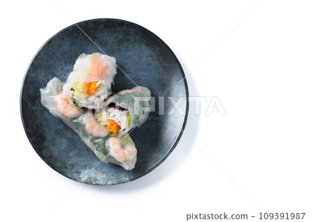 Vietnamese spring rolls with vegetables, rice noodles and prawns isolated on white background Vietnamese spring rolls with vegetables, rice noodles and prawns isolated on white background 109391987