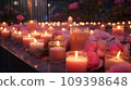 Aromatic candles burns creating coziness and relaxing atmosphere on table in spa procedure salon 109398648