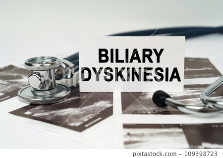On the ultrasound pictures there is a stethoscope and a business card with the inscription - Biliary dyskinesia On the ultrasound pictures there is a stethoscope and a business card with the inscription - Biliary dyskinesia 109398723