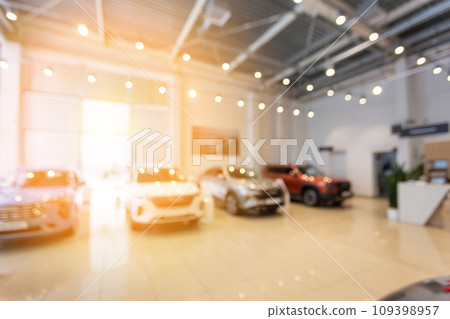Blurred new car parked in modern showroom waiting for sales. Blurred new car parked in modern showroom waiting for sales. 109398957