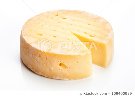 A closeup of a cheese with a slice taken away with holes like maasdam, emmental or cheddar as background 109400959