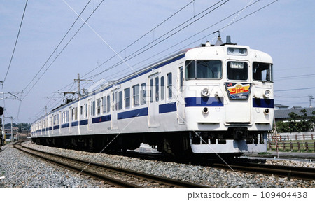 1988 421 series train running near Mizuki Station on the Kagoshima Main Line 1988 421 series train running near Mizuki Station on the Kagoshima Main Line 109404438