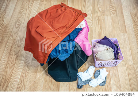 Clothes prepared for washing 109404894