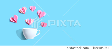 Coffee cup with paper craft hearts 109405942