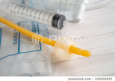 Foley urinary catheter with urine bag for disability or patient in hospital. 109408995